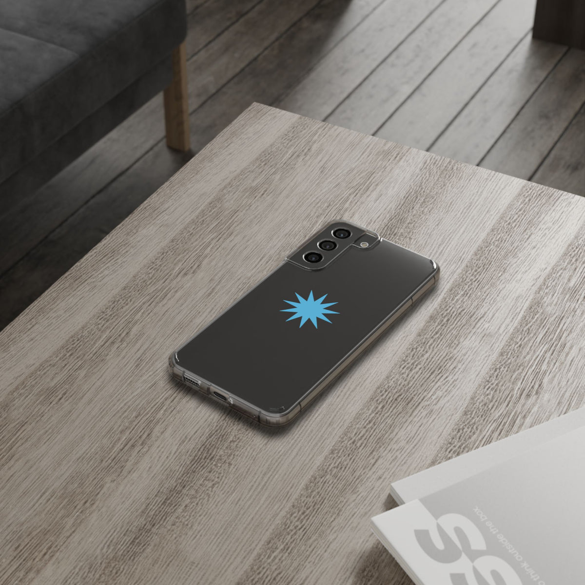 Clear Impact-Resistant Phone Case — Blue Starburst Design