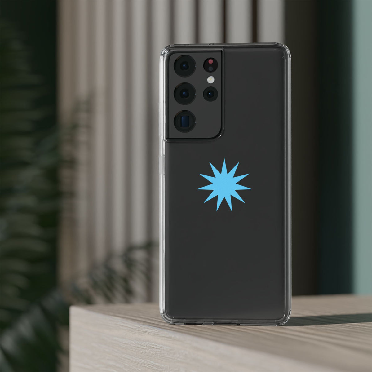 Clear Impact-Resistant Phone Case — Blue Starburst Design