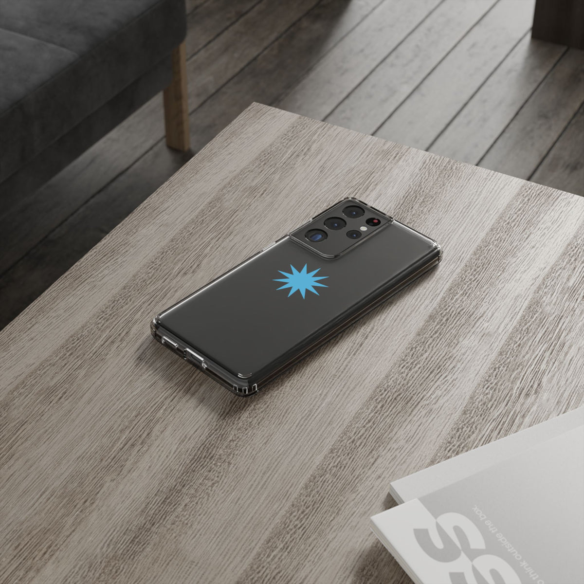 Clear Impact-Resistant Phone Case — Blue Starburst Design