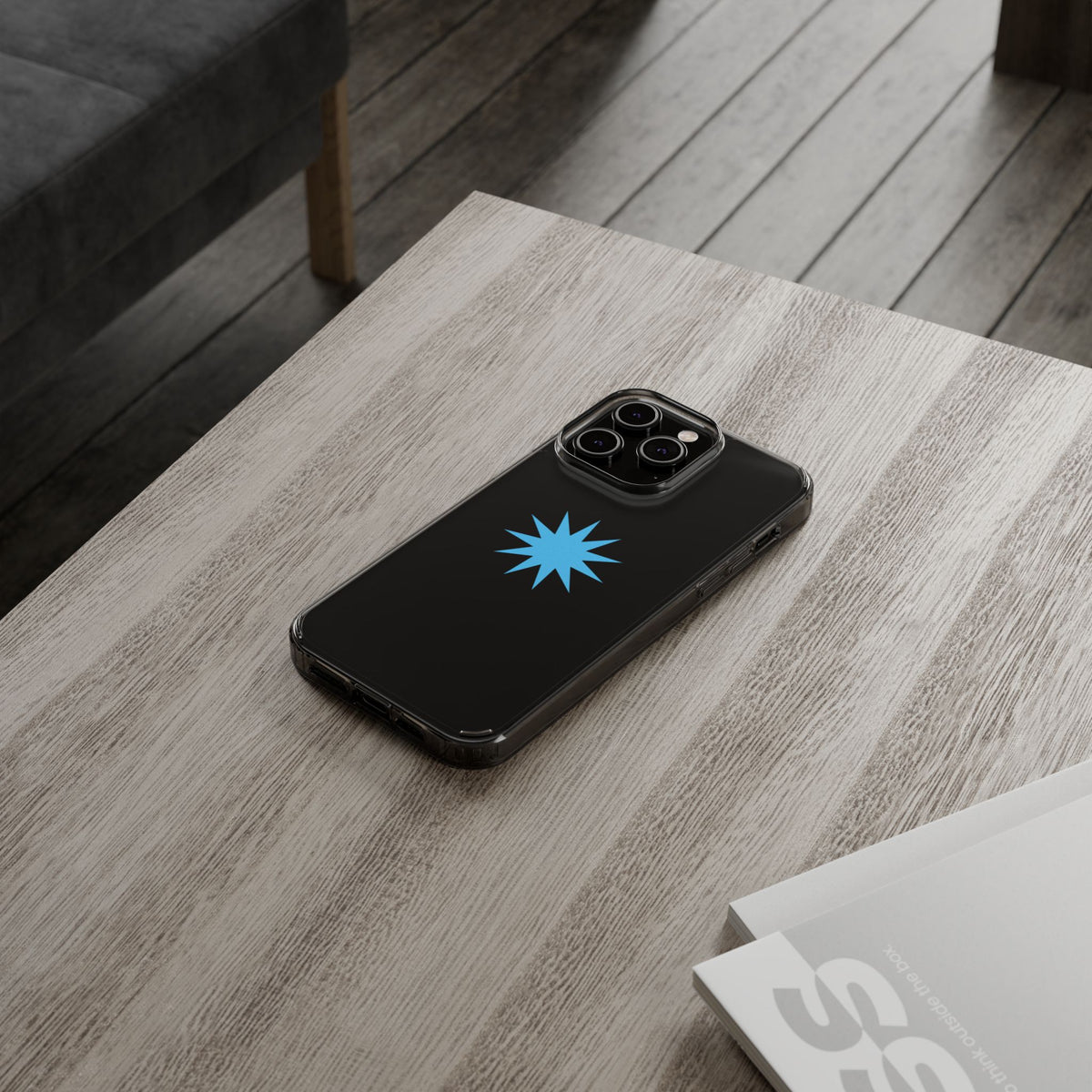 Clear Impact-Resistant Phone Case — Blue Starburst Design