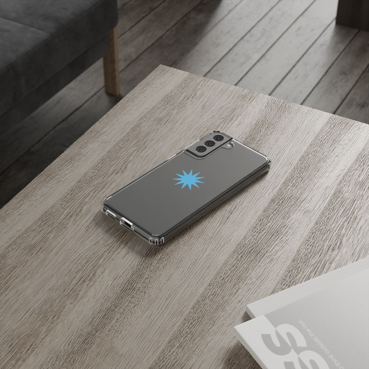 Clear Impact-Resistant Phone Case — Blue Starburst Design