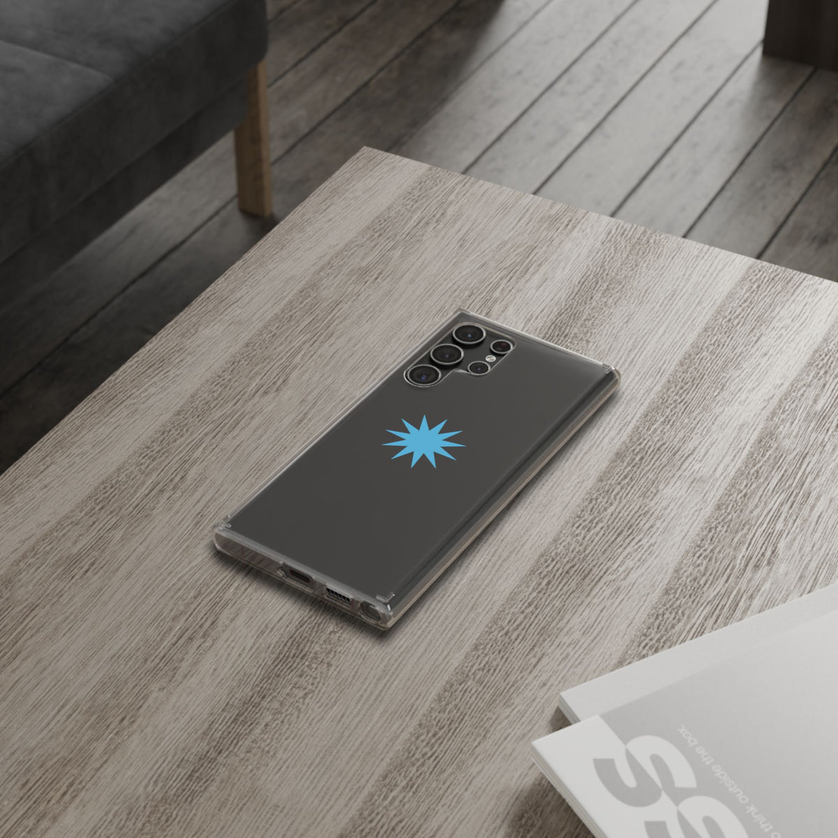 Clear Impact-Resistant Phone Case — Blue Starburst Design