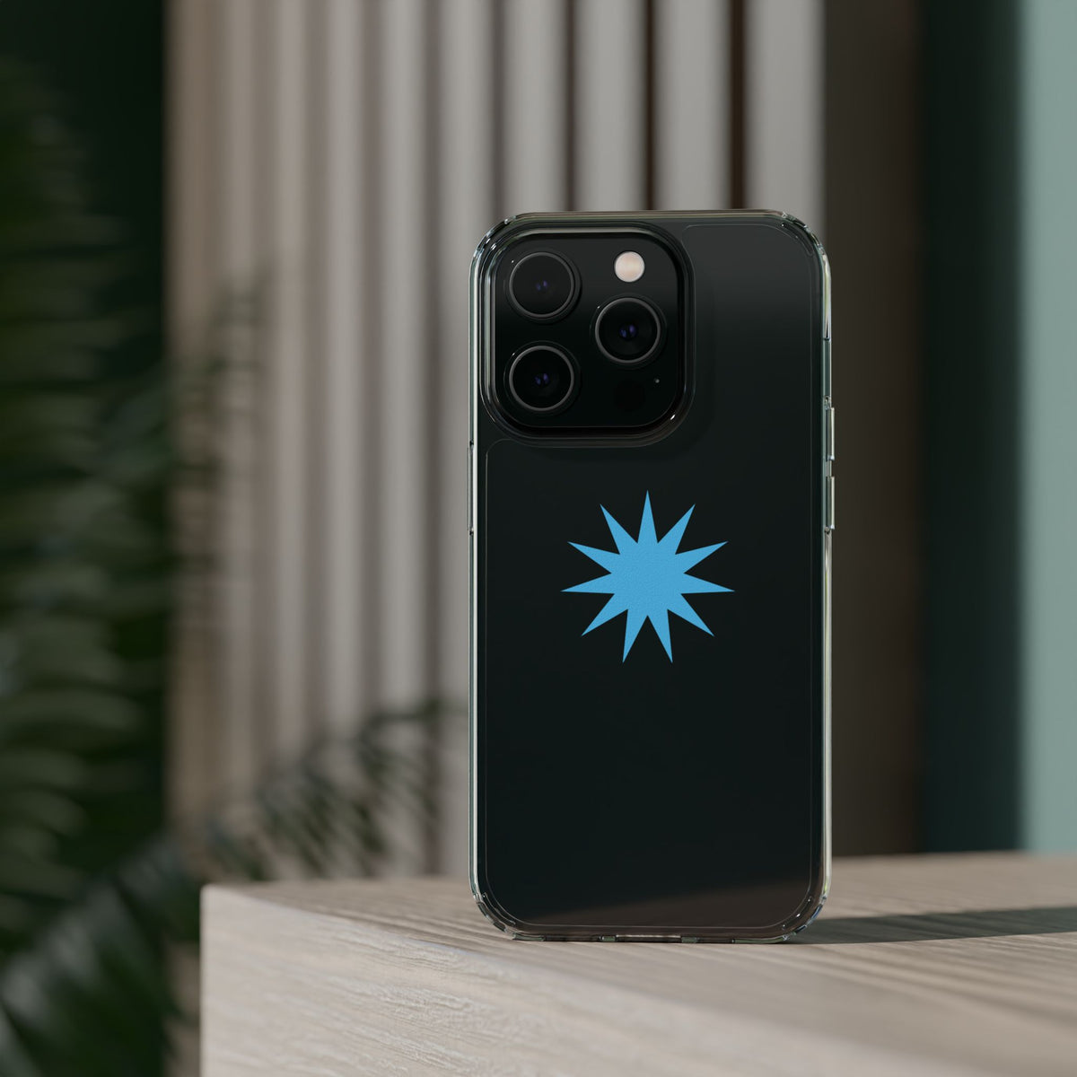 Clear Impact-Resistant Phone Case — Blue Starburst Design