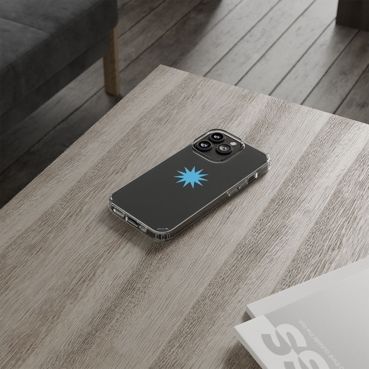 Clear Impact-Resistant Phone Case — Blue Starburst Design