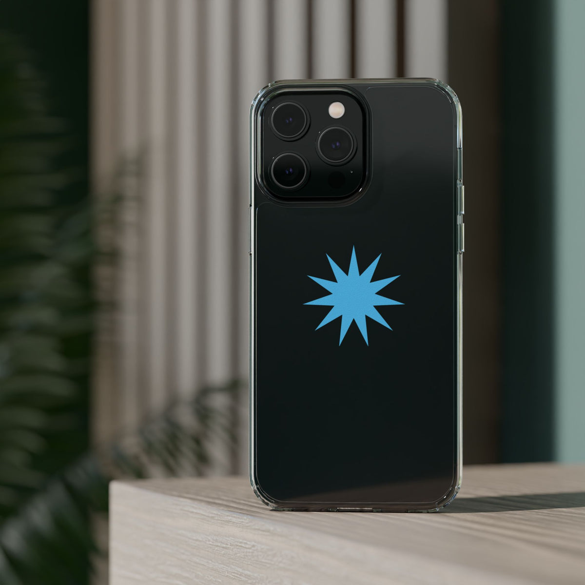 Clear Impact-Resistant Phone Case — Blue Starburst Design