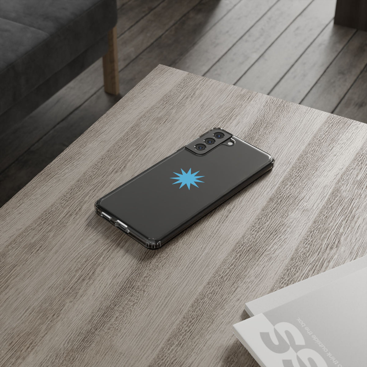 Clear Impact-Resistant Phone Case — Blue Starburst Design